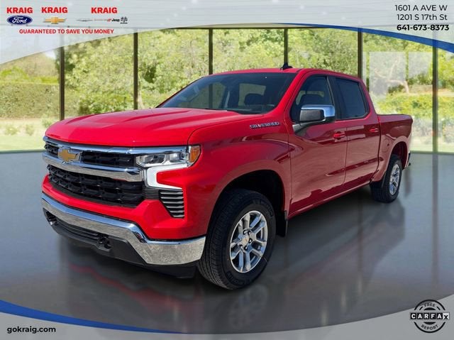 2026 Chevrolet Silverado 1500 LT in Red Hot — front three-quarter view