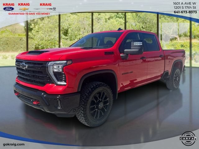 2026 Chevrolet Silverado 2500 HD LT in Red Hot — front three-quarter view