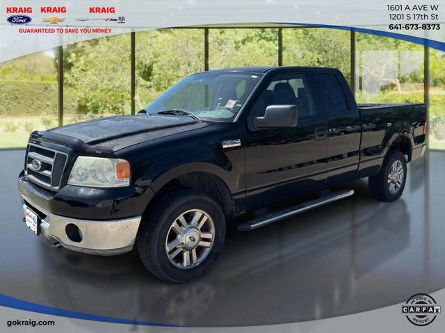 2006 Ford F-150 XLT in Black — front three-quarter view